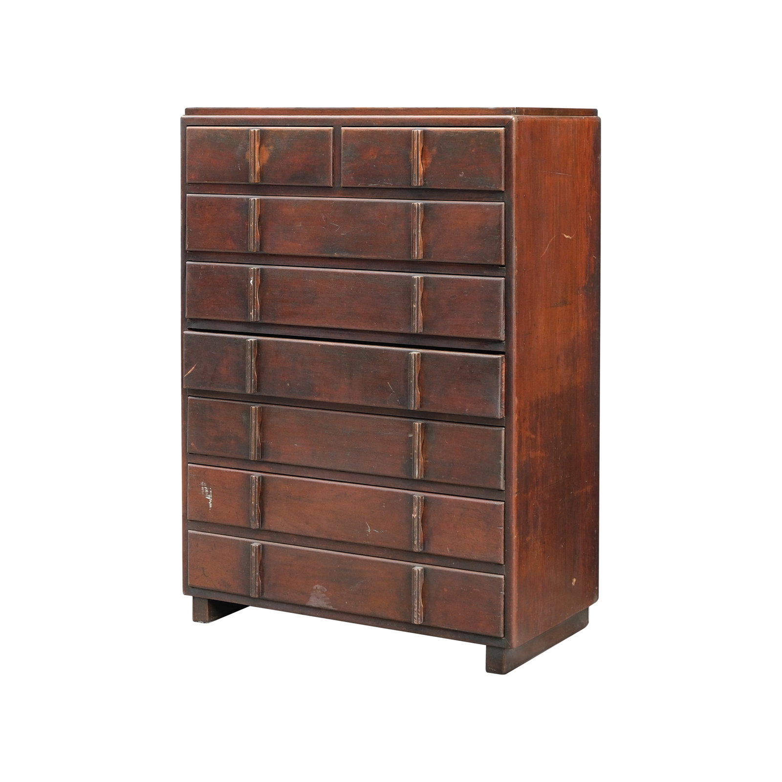 A Circa 1950’s Chest of Drawers: narra H: 48 1/4” (123 cm) L: 18 3/4” (48 cm) W: 36” (91 cm)