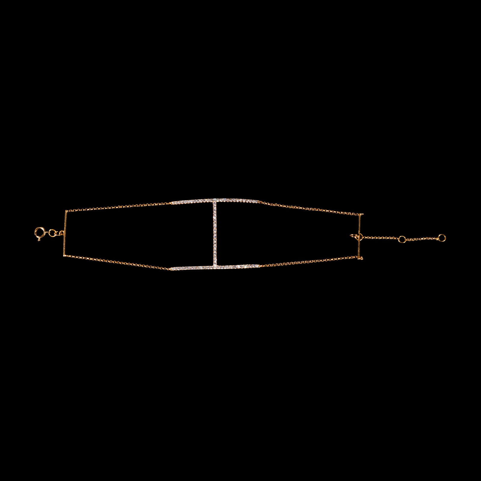 A Modern Diamond Bracelet in 18k: The bracelet of contemporary designis accented by diamonds weighingapproximately 0.365 cts. Hallmarked 750. Weighs 3.60 grams. The bracelet length is 7 inches.