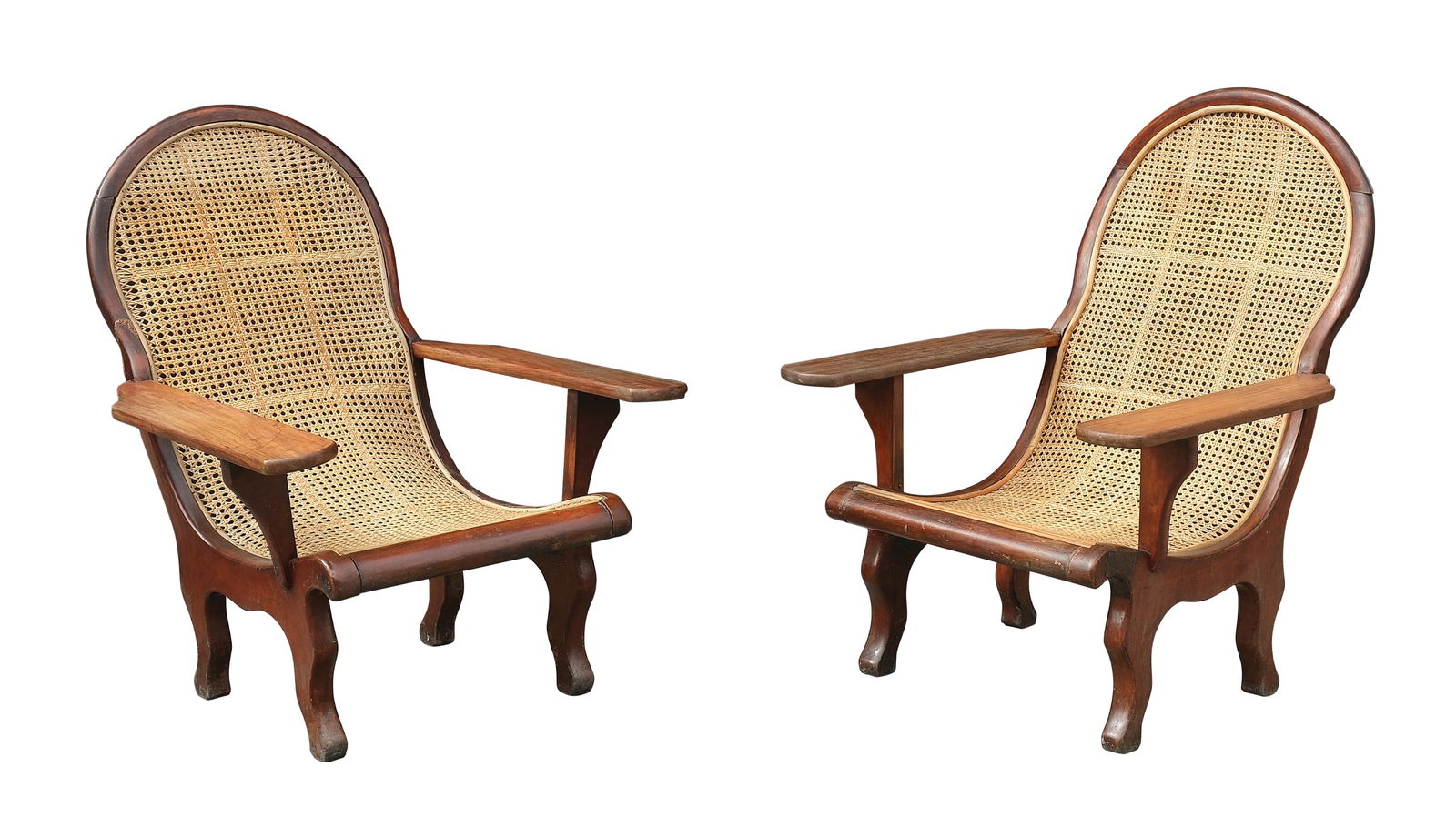 A Pair of Butacas: a.) H: 42” (107 cm)L: 32” (81 cm)W: 34” (86 cm) b.) H: 42 3/4” (109 cm)L: 32” (81 cm)W: 34” (86 cm)