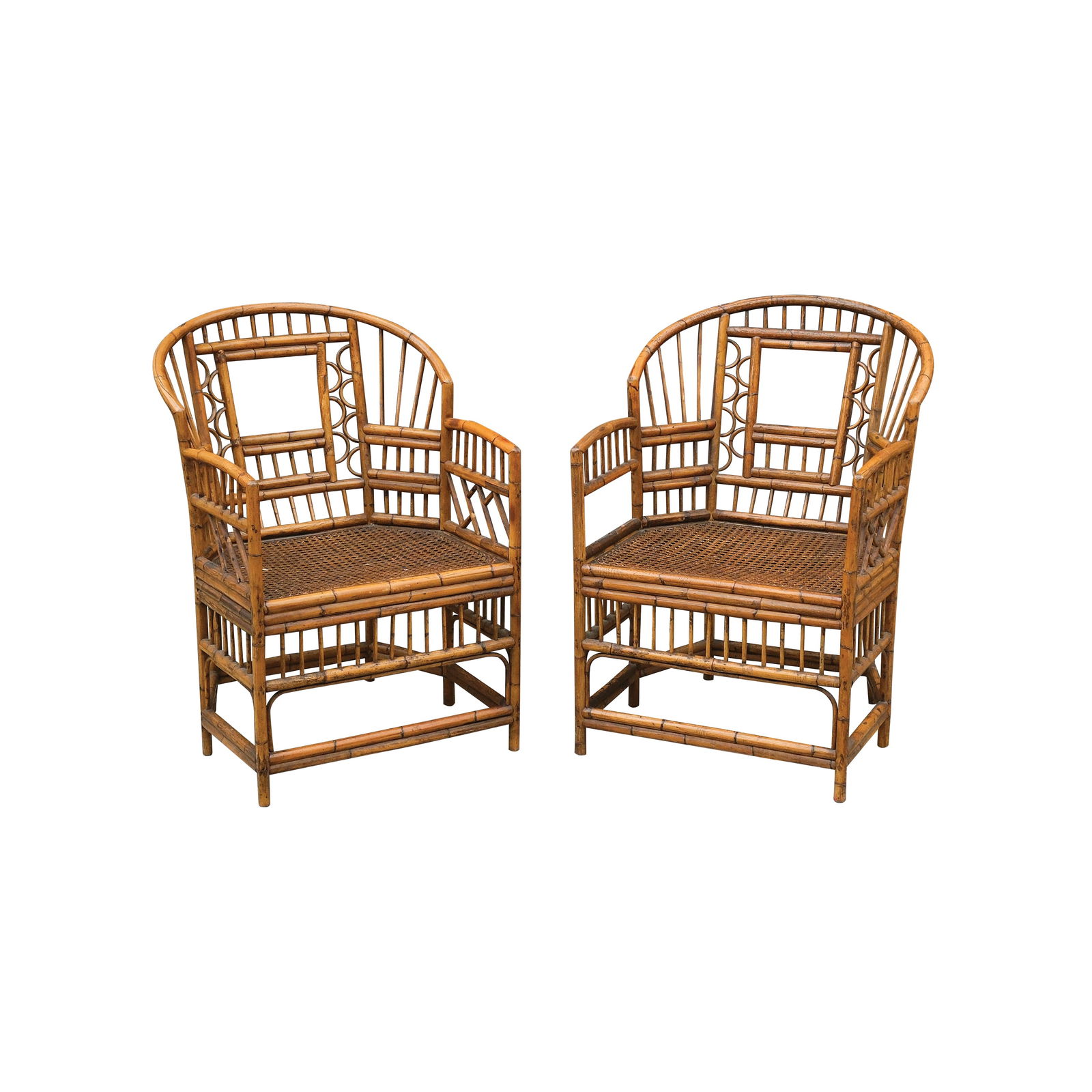 A Pair of Accent Chairs: rattan H: 34” (87 cm) L: 24 1/2” (62 cm) W: 23” (58 cm)