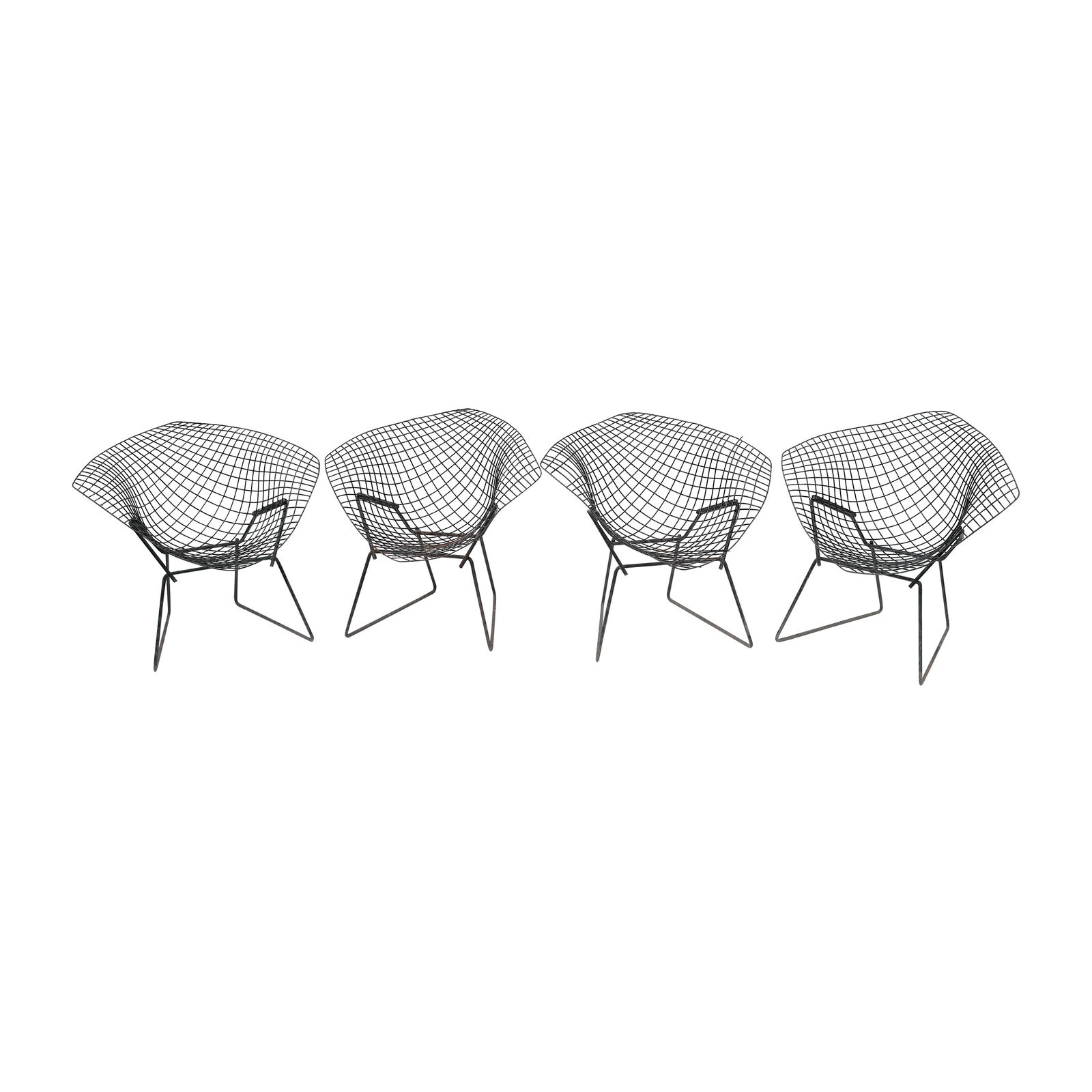 Four Circa 1970’s Bertoia-Style Chairs: steel H: 28” (71 cm) L: 32 1/2” (83 cm) W: 27” (69 cm)
