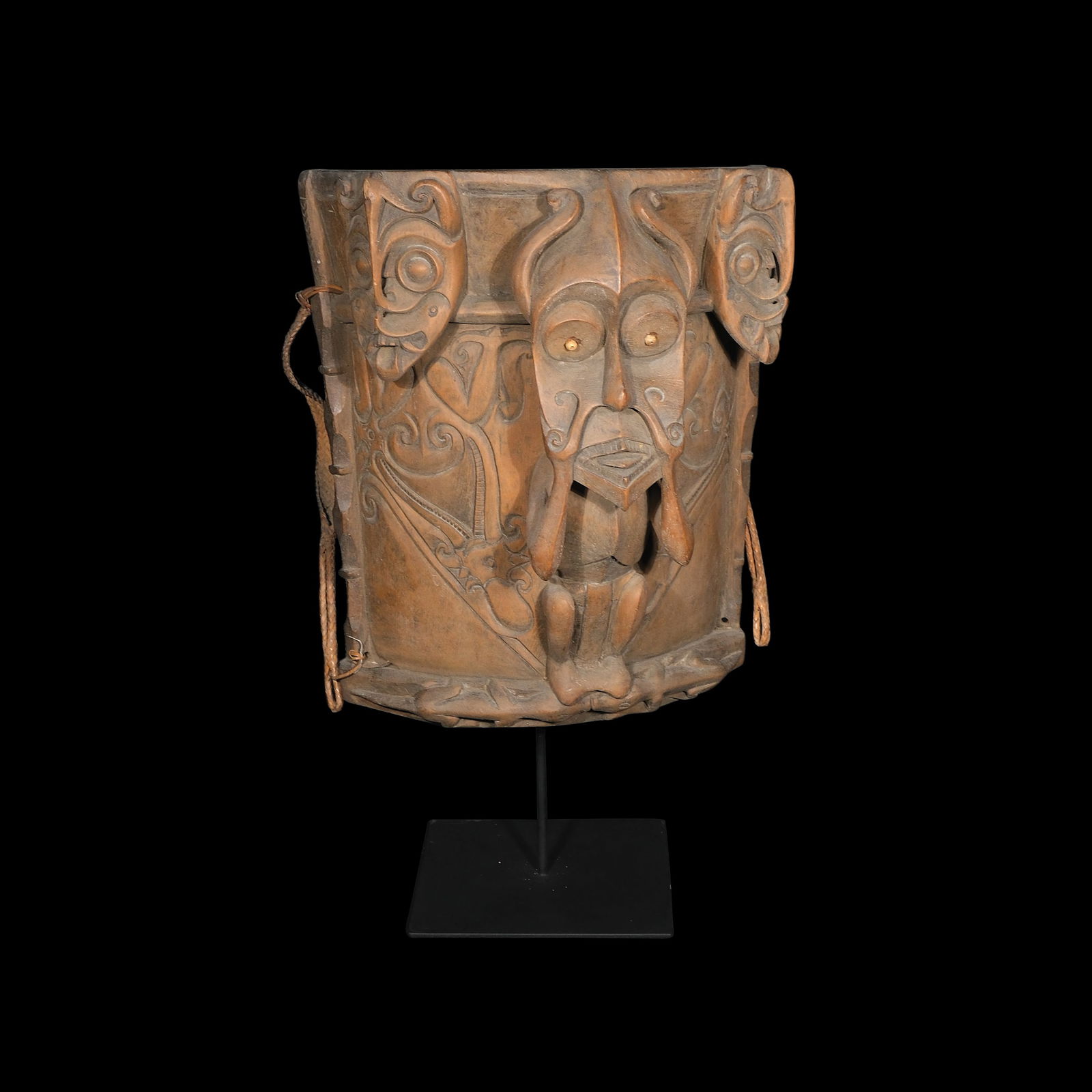 A Tribal Chestplate: PROPERTY OF A DISTINGUISHED LADY hardwoodH: 23 1/2” (60 cm)L: 14” (36 cm)W: 6” (15 cm)