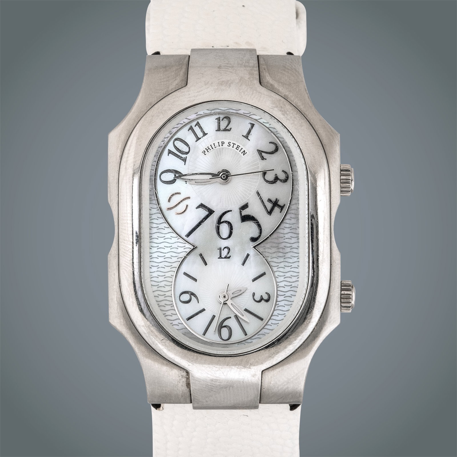 Philip Stein Signature Large: Reference: 2TF144536 Year: 2010s Movement: Quartz Calibre: Philip Stein quartz calibre Functions: Hours, minutes, seconds Case: Stainless steel, tonneau-shaped; sapphirecrystal Case size: Large (appro