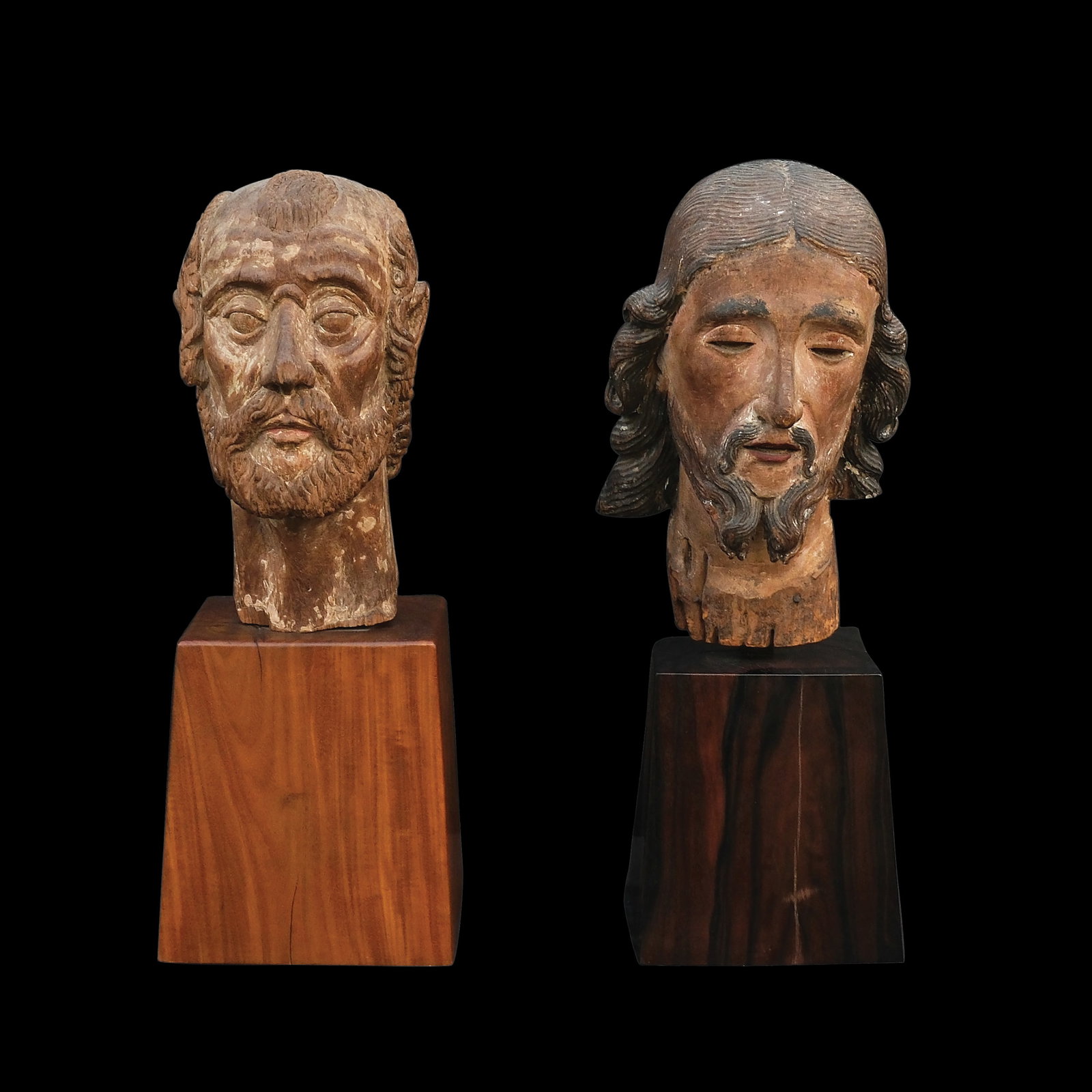 Two 19th Century Busts: polychromed hardwooda.) H: 19” (48 cm)L: 7” (18 cm)W: 6” (15 cm) b.) H: 19” (48 cm)L: 7” (18 cm)W: 6” (15 cm)PROVENANCE:Johnny Ramirez Collection