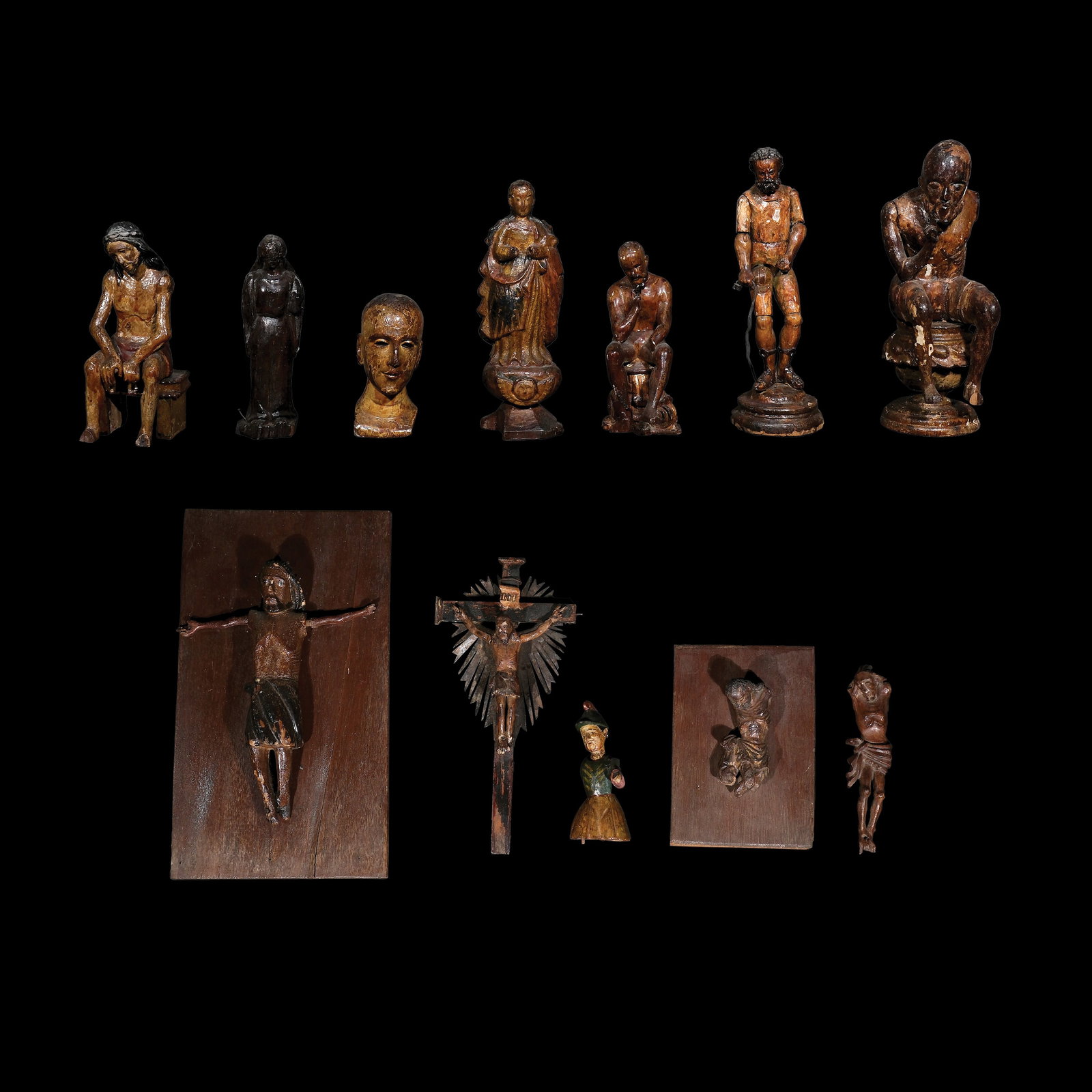 A Collection of Twelve Santos de Bulto (1 of 1)