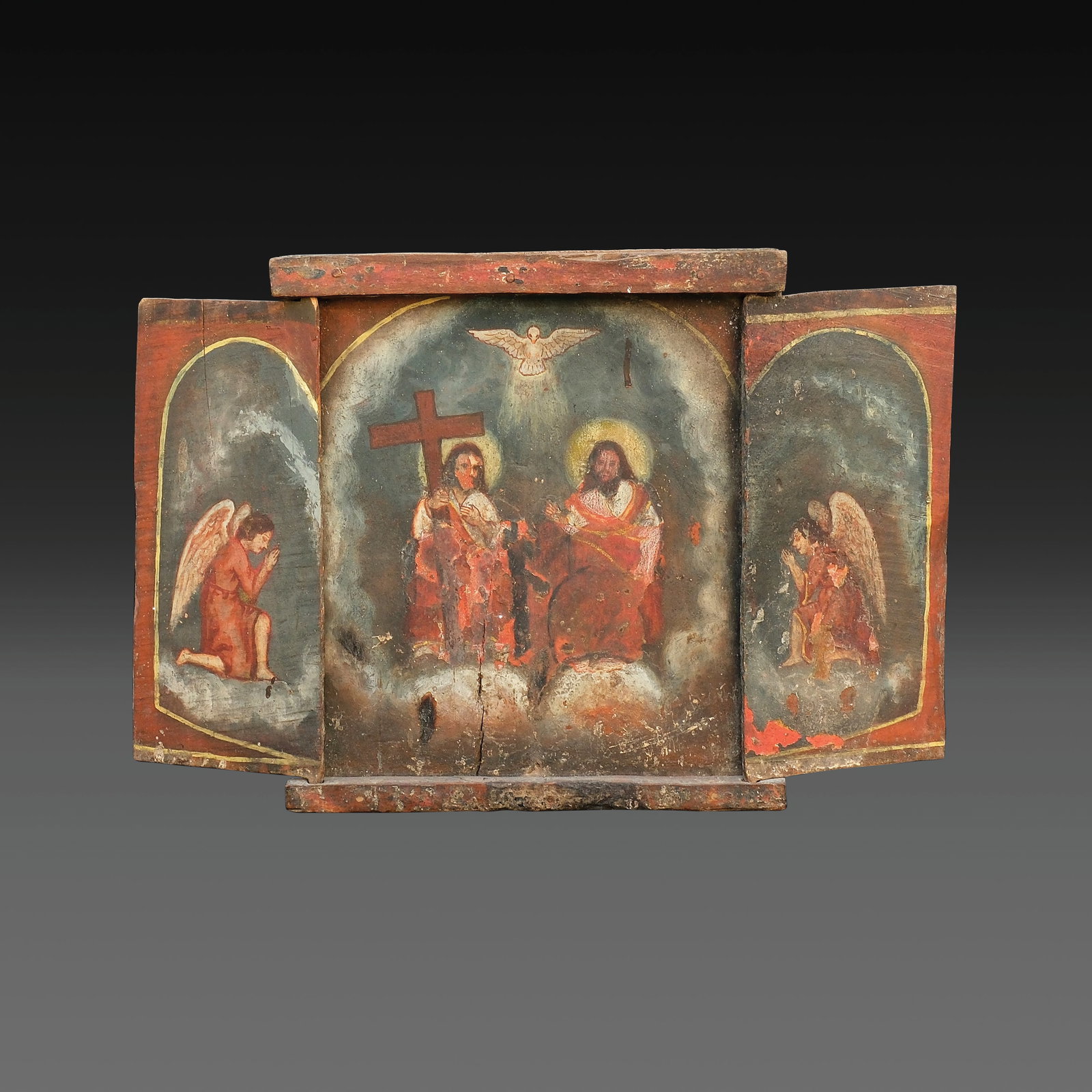 An Antique Bohol Triptych Depicting the Tres Personas: polychromed woodopen:19” x 29 1/2” (48 cm x 75 cm) close:19” x 17” (48 cm x 43 cm)