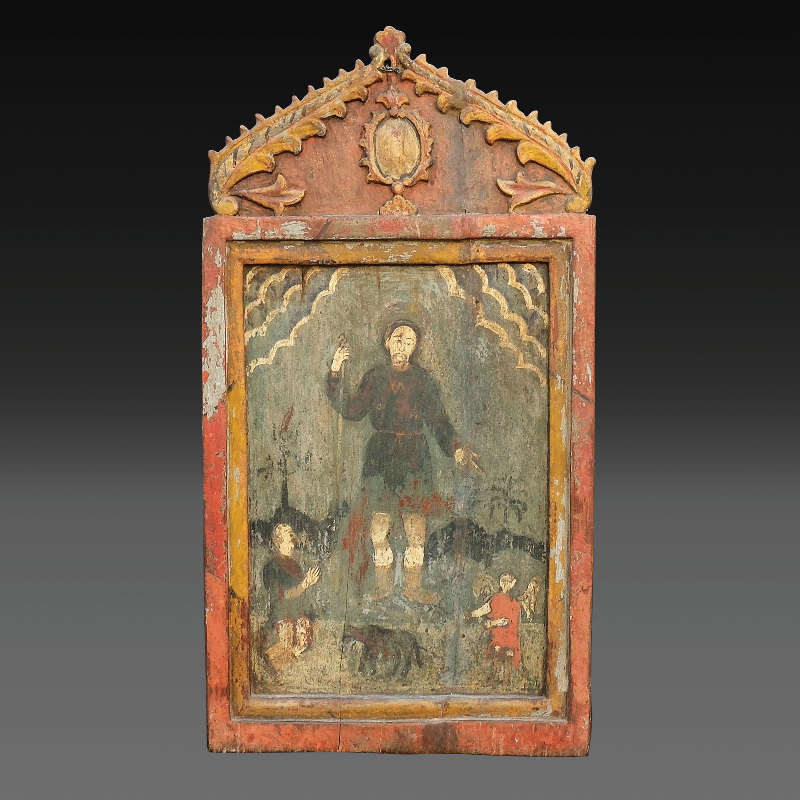 A Religious Icon: polychromed hardwood31 3/4” x 17” (81 cm x 43 cm)