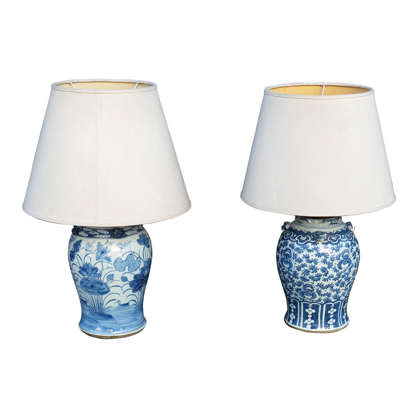 Two Table Lamps with Oriental Jar Bodies: a.) body:H: 28” (71 cm)D: 10” 925 cm) shade:H: 15” (38 cm)D: 20” (51 cm) b.) body:H: 27” (69 cm)L: 9” (23 cm) shade:H: 13 1/2”