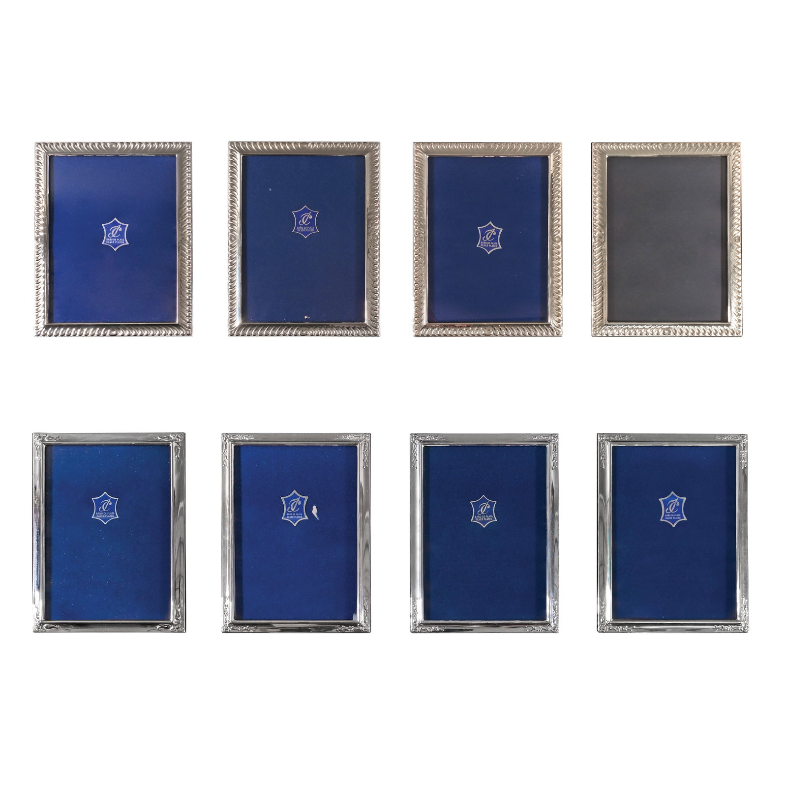 Eight Silver Plated Frames: 11” x 8 3/4” (28 cm x 22 cm)8 1/4” x 6 1/4” (21 cm x 16 cm)