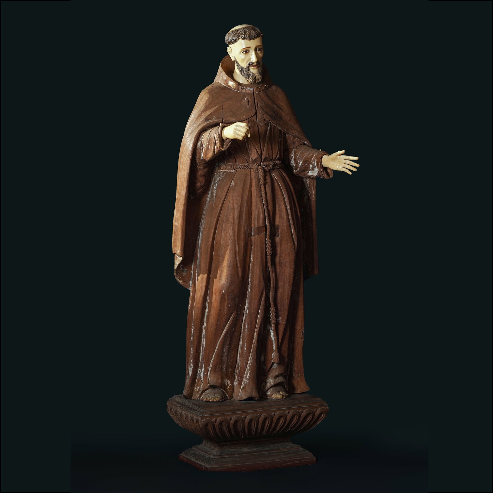 San Francisco de Asis: PROPERTY OF A DISTINGUISHED GENTLEMAN Early 19th Century Ivory head and hands medium-hardwood H: 55 3/4" (142 cm) L: 19 1/2" (50 cm) W: 13 1/2" (34 cm) P 500,000 Made in Binondo, Manila; while many m
