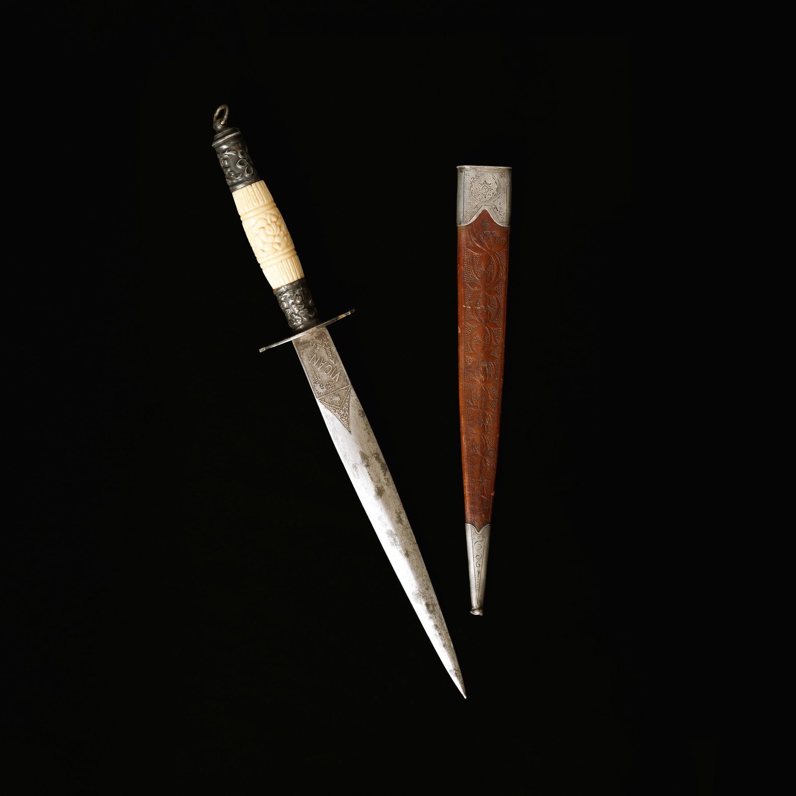 The ?Tinio Brigade? Dagger: c. 1899 Total length, engraved with “Vigan” on the obverse and “Filipinas’ on the reverse, with the republic’s flag iconography dagger: L: 12" (30 cm) W: 2" (5 cm) hilt, 