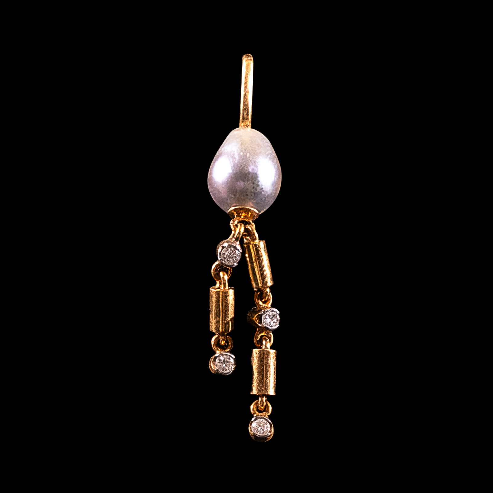 A Pearl and Diamond Pendant in 14k: Set in a minimalist 14k yellow gold design, the pendant features an 8mm drop pearl accented by diamonds weighing approximately 0.18 cts. Weighs 1.90 grams. One stone noted as Refer on the GIA iD100&re