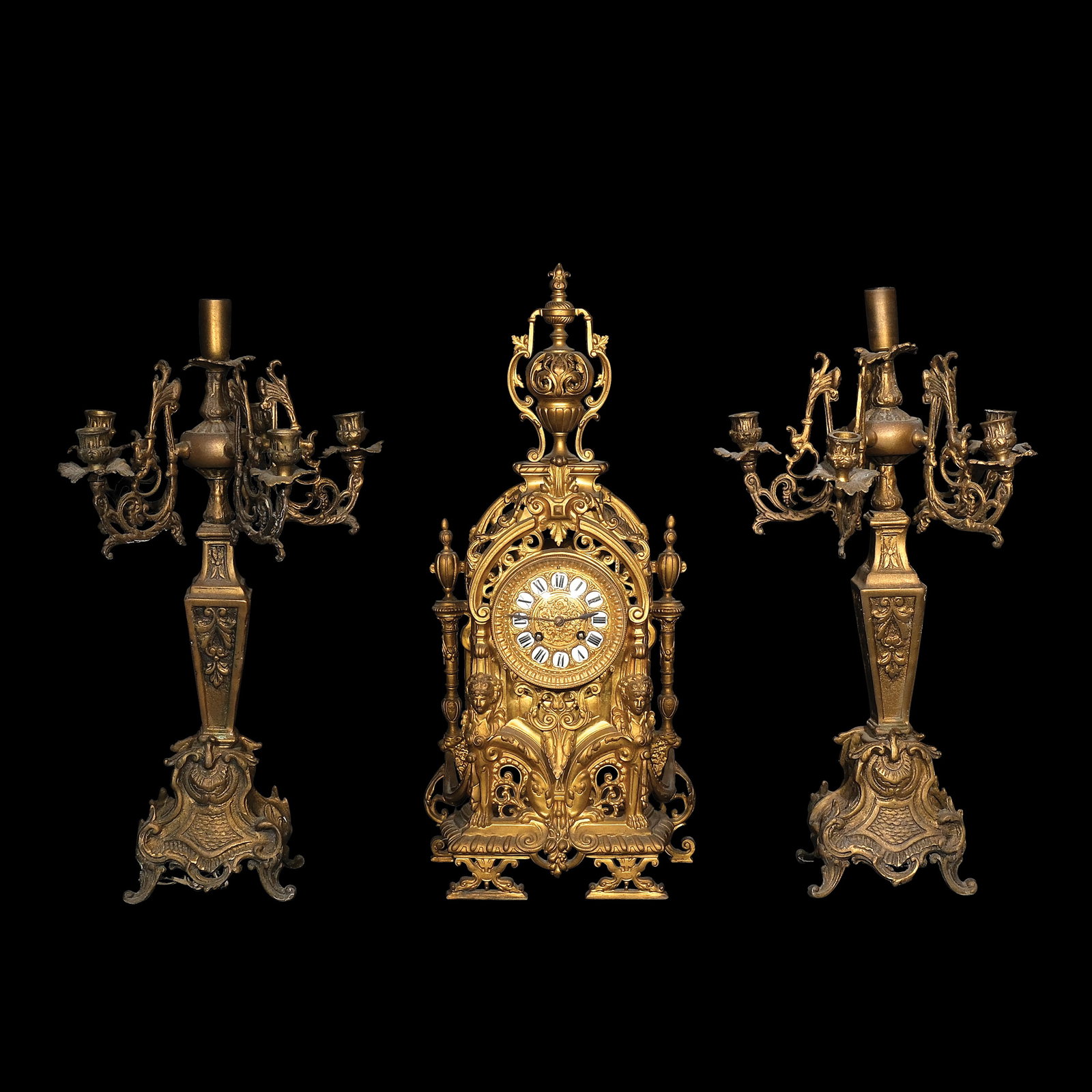 An Antique Mantle Clock with a Pair of Candelabras (1 of 4)
