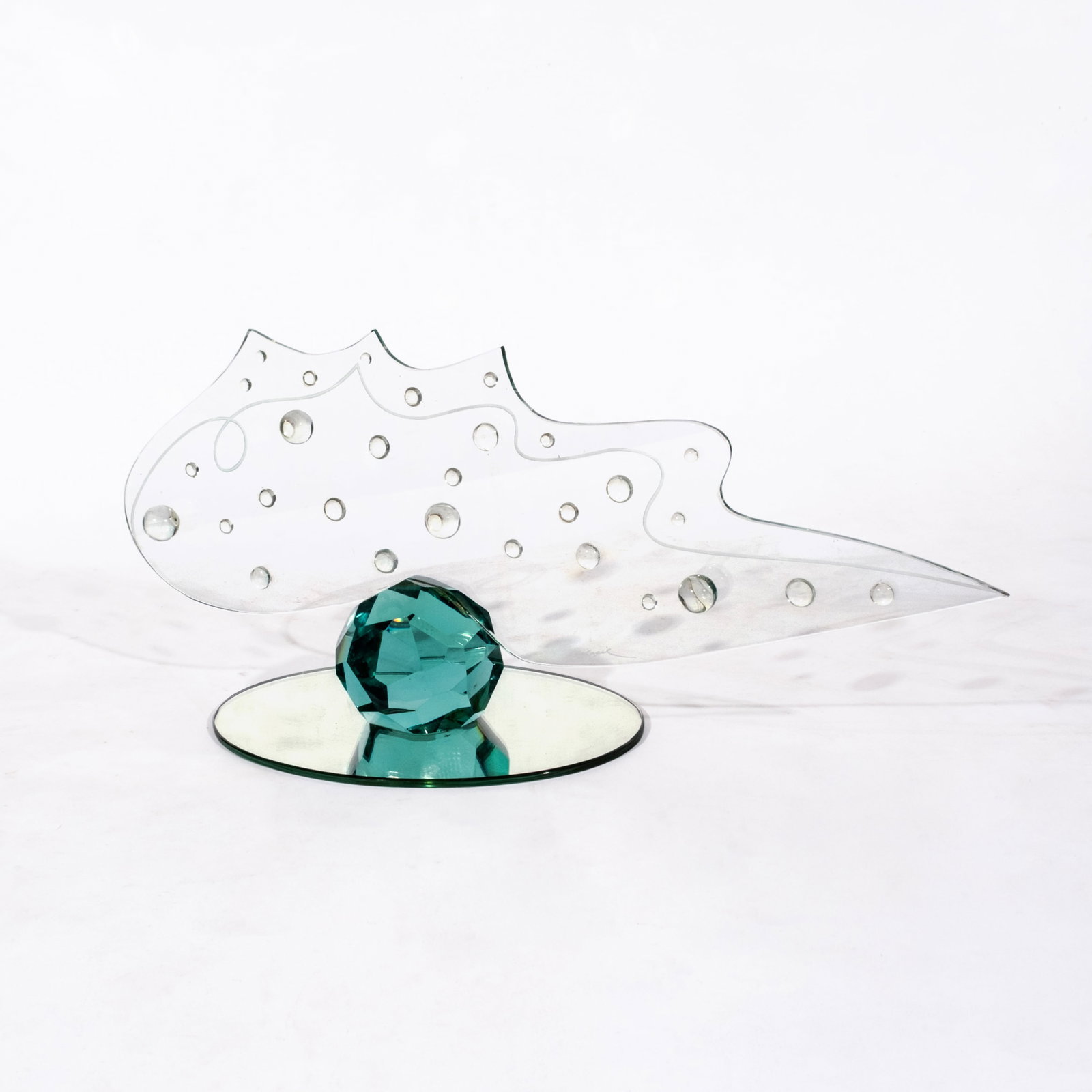Impy Pilapil (b. 1949): Untitled signed (lower right) glass H: 10 1/4" (26 cm) L: 24 1/4" (62 cm) W: 9" (23 cm) PROVENANCE Private collection, Manila Known for her signature exploration of glass, light, and nat