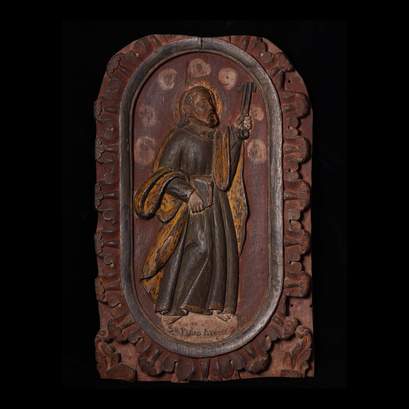 San Pedro Apostol: bas–relief/relleve Mid 19th Century Molave wood (“Vitex parviflora”) H: 28 1/2" (72 cm) L: 17 3/4" (45 cm) W: 2" (5 cm) PROVENANCE Bohol island Ex Coll: Private Collection This cha