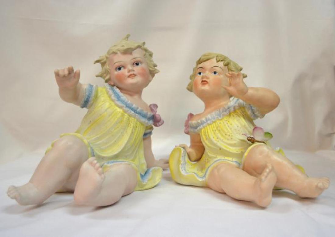 VINTAGE PAIR OF BISQUIT PIANO DOLLS: Vintage Pair of German Bisquit Piano Dolls, measures 8x8" hight