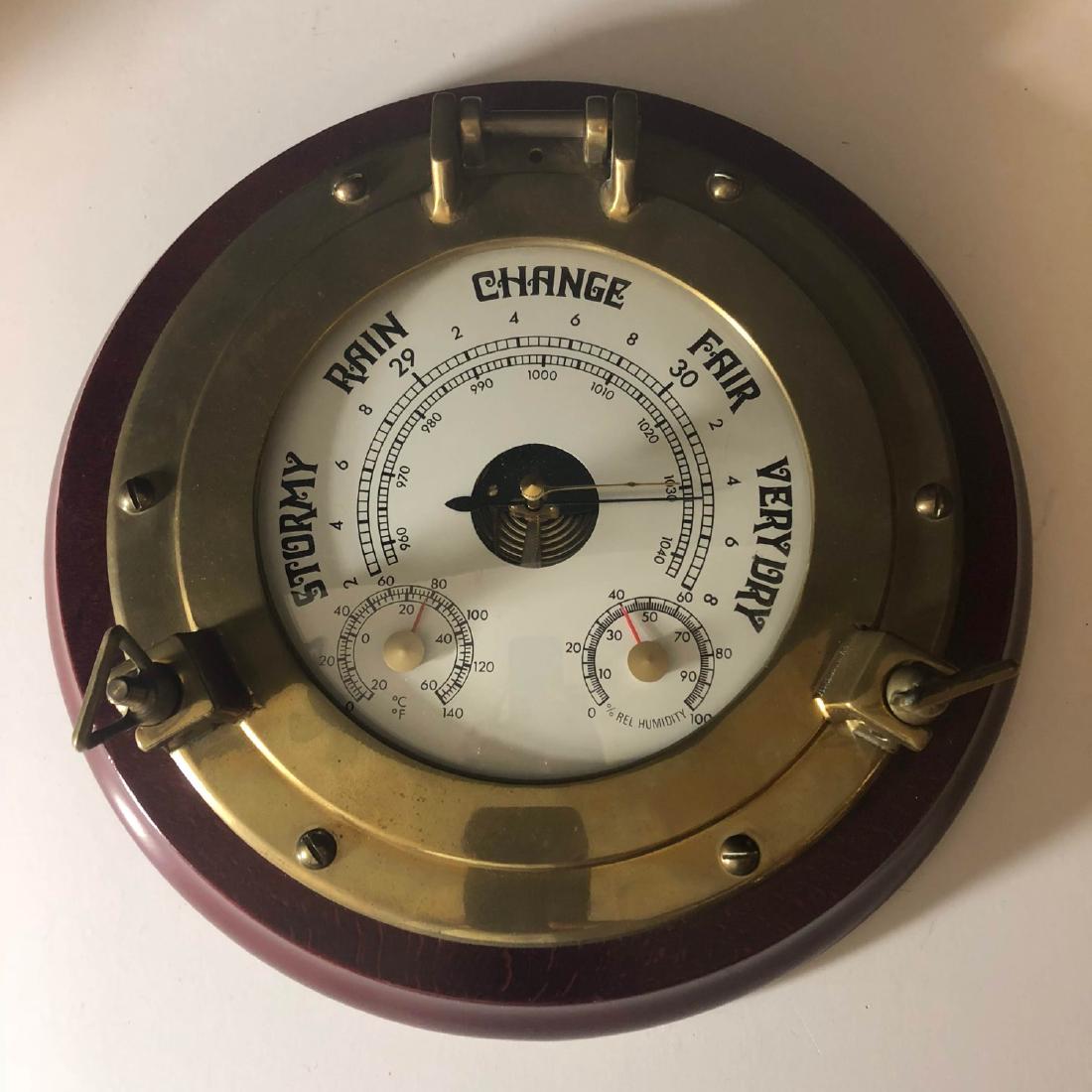 Large solid brass porthole barometer