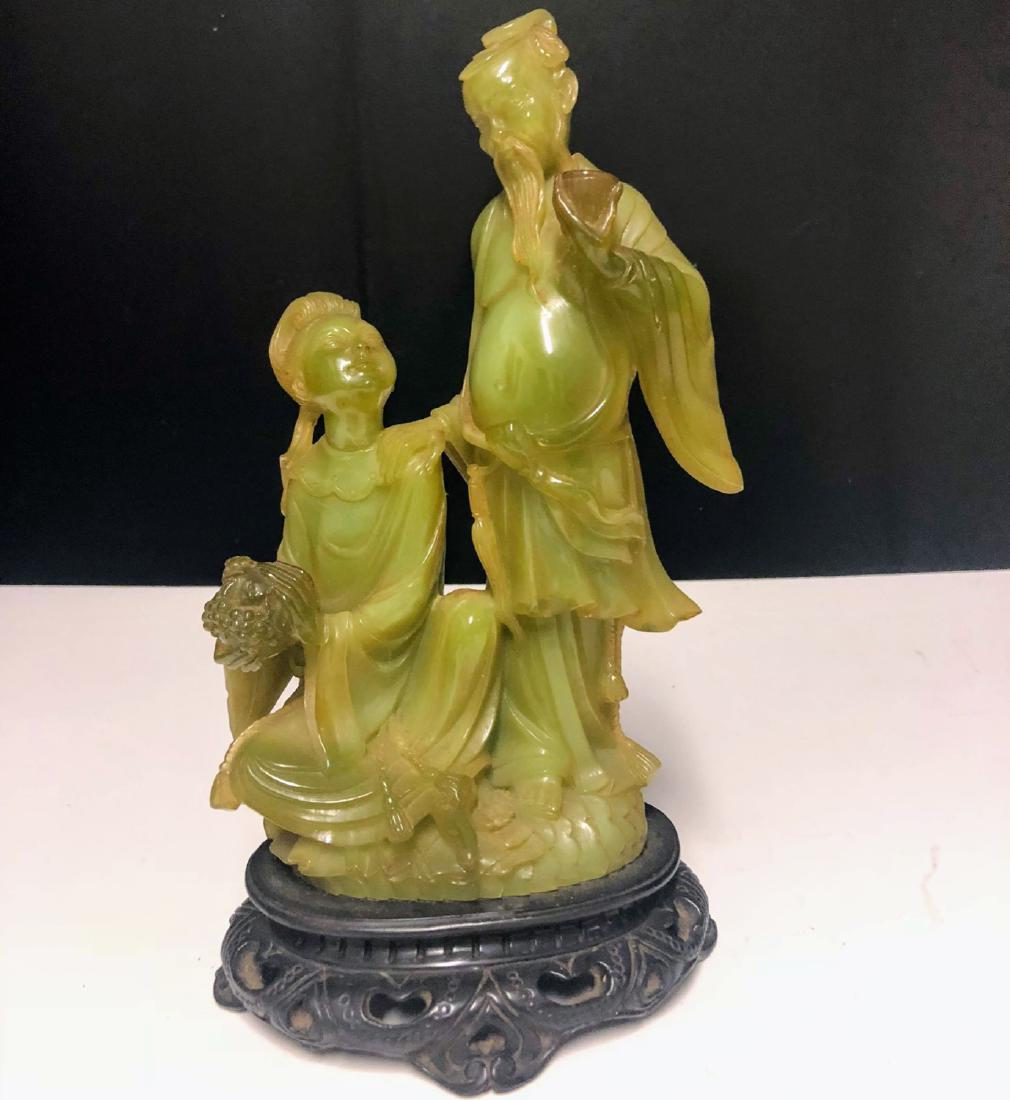 Antique Chinese Carved Soapstone Figure: Antique Chinese Carved Soapstone Figure measures 10.5 inches