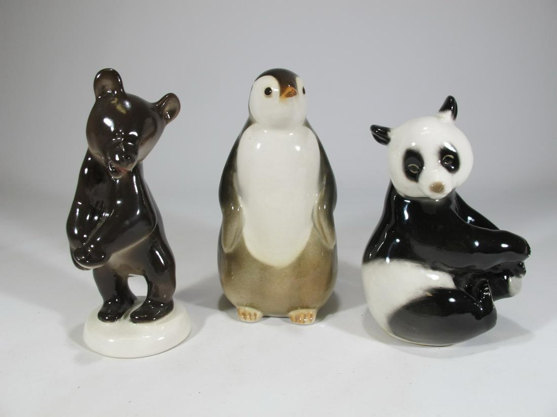 Lot of 3 Russian Lomonosov Panda, Bear & Penguin: Lot of 3 Russian Lomonosov Panda, Bear & Penguin porcelain statues. Bear: 5 7/8 in H x 2 3/8 in W, Panda: 5 3/8 in H x 3 3/8 in W x 2 5/8 in D, Penguin: 5 7/8 in H x 2 3/4 in W x 3 1/8 in D.