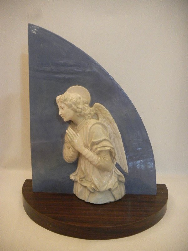 Italian Antique Ceramic Relief: An Italian relief of an angel, made of antique ceramic, very similar to vatican pieces. 13" x 23 1/4" x 25 7/8"