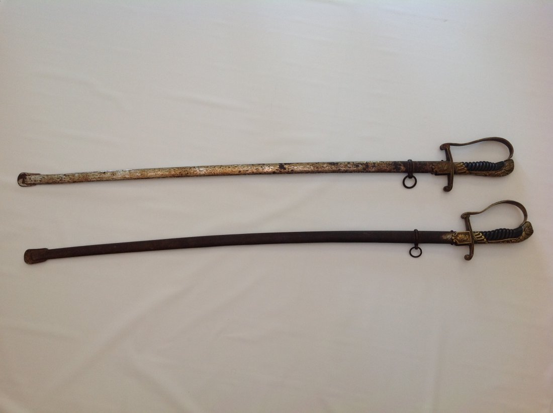 Antique Argentinian Swords: This is a lot of two antique Argentinian swords. Very interesting sword pieces that feature engravings on the blades and intricate handguard and pommel work displaying images of Argentinian statehood.