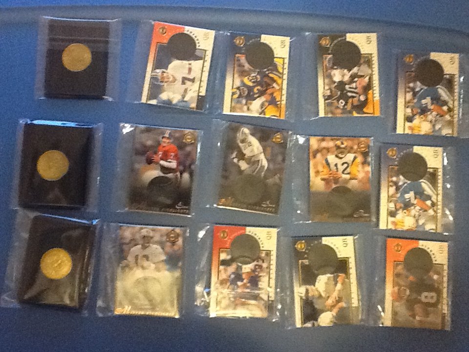 1997 Pinnacle Mint Football Collection with Coins Vario: 1997 Pinnacle Mint Football Collection with Coins; Minted Smith, Banks, Marino, Elway Regular with coins: Bledsoe,Mitchell, Blake, Banks, Aikman, Stewart, Elway. Coins Only, Shuler, , Smith, Favre, Yo