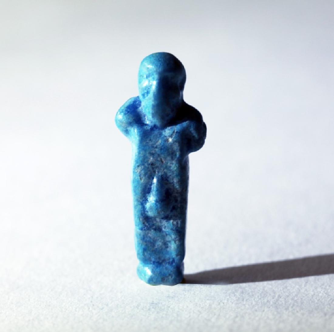 Rare Egyptian Faience Amulet of Herm: Egypt; Ptolemaic- Roman Period, c. 1st century BC- 1st century AD. Rare depiction of a Herm with prominent phallus. Pierced for suspension behind shoulders. 1 - 1/8" (2.8 cm) Provenance: The John J. S