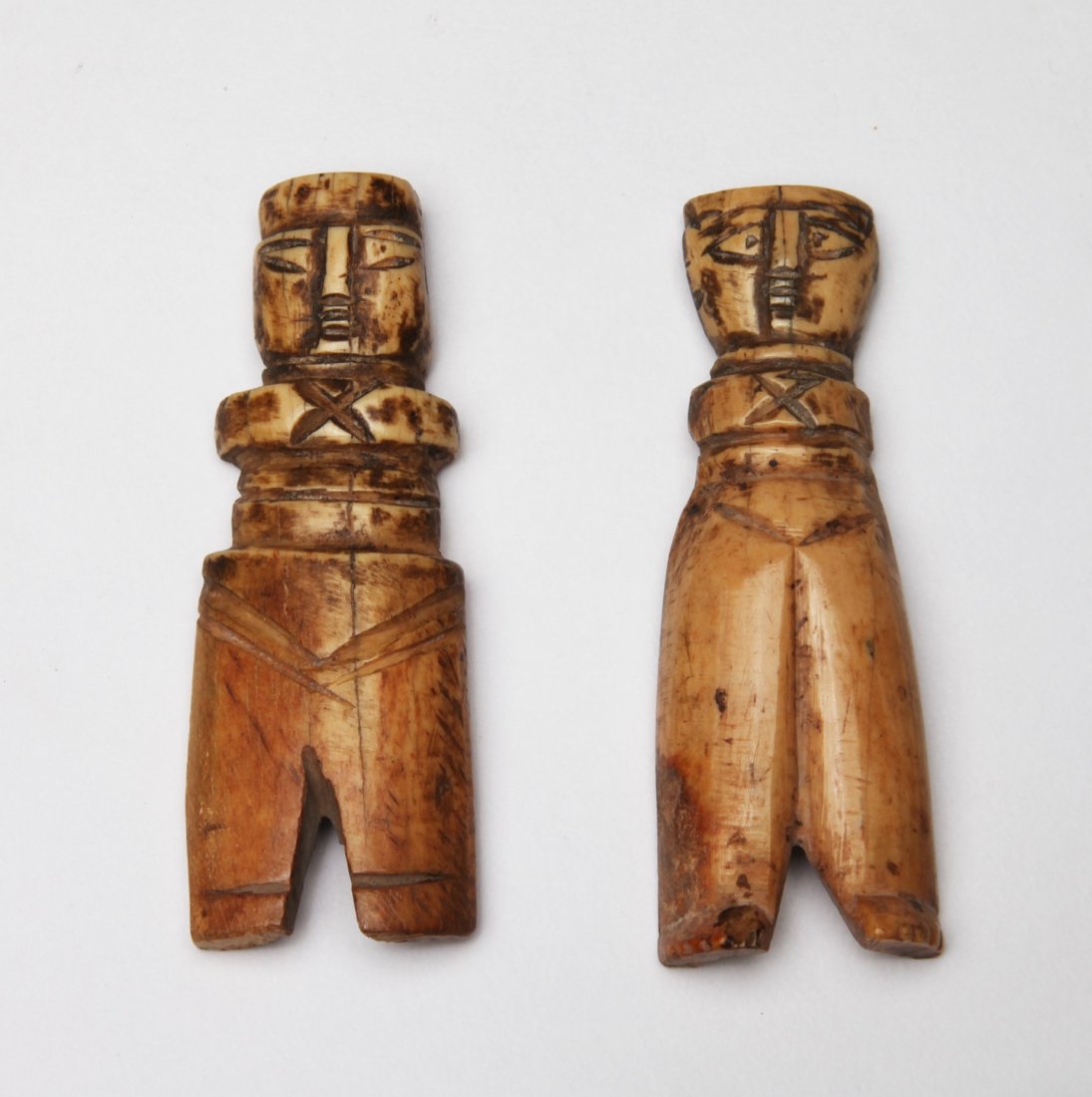 2 Coptic Bone Dolls: Egypt; c. 4th-5th century AD.Two nice bone dolls with good patina and clear details. 3.25" (8.5 cm) Each. Provenance: The John J. Slocum Collection Mr. Slocum (1914-1997) collected most of his antiqui