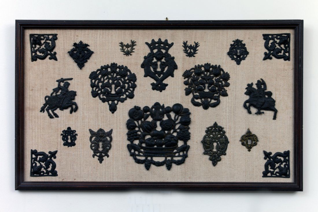 Framed Group of 18 Bronze Escutcheons and Mounts. Ex. (1 of 2)