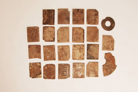 Ancient Chinese Burial Tiles EX: Robert Ellsworth: China; c. 1-200 century AD. Group of 22 tiles and fragments. Possibly jade. From a Burial suit of a high ranking individual. Most of tiles are pierced for attachment, several have carved images of dra