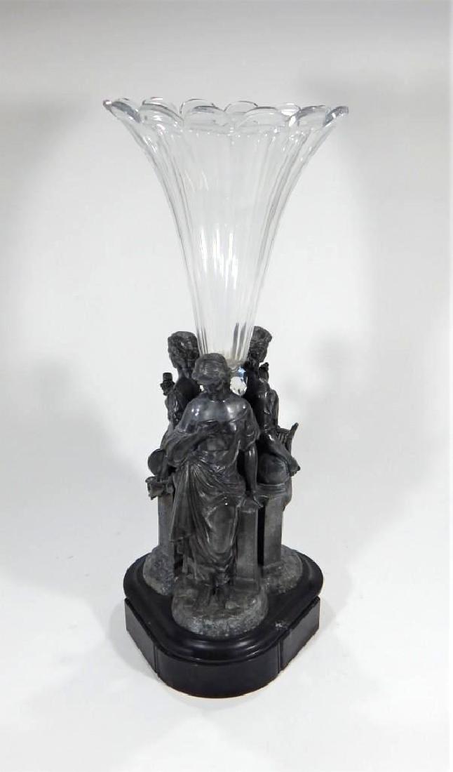 Antique Victorian Epergne: A Victorian epergne with three metal robed female allegories supporting the glass vase. Excellent original condition, missing two small pieces to marble base. Width: 9"Height: 24"
