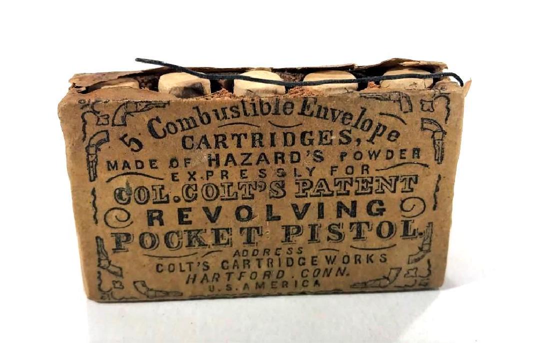 Rare Colt Pocket Pistol .36 Cal Cartridges: Small wood box intact containing bullets with some loss to top paper as shown. Wrapped in cellophane for protection. Circa. 1870's