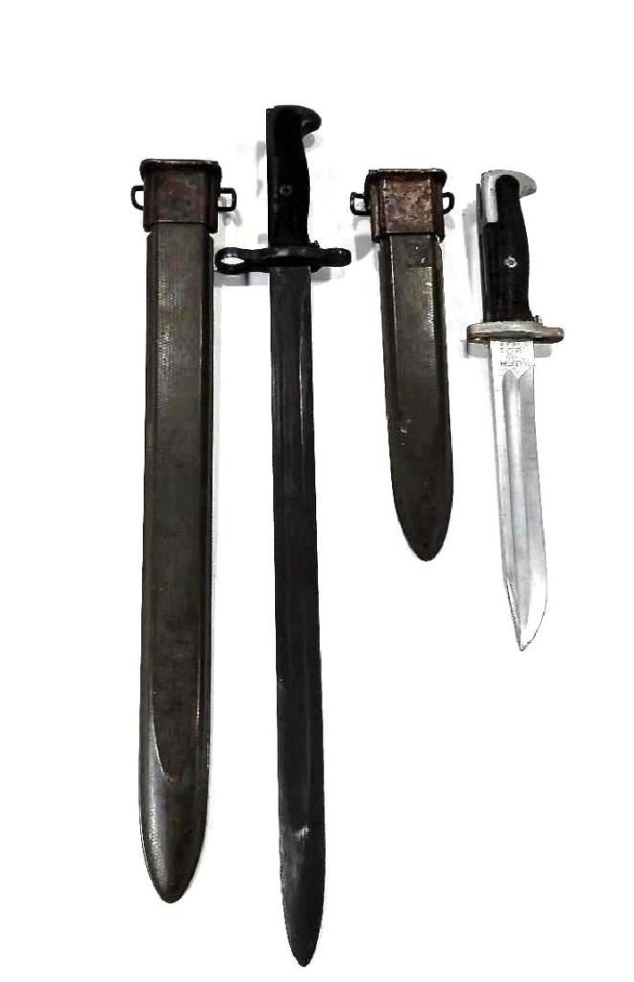Pair of World War 2 Bayonets, "Union Fork & Hoe": Large Bayonet measures 20.5", small bayonet measures 12" Both come complete with original scabbards. Dated 1942 &1943 respectively.Very good original condition.