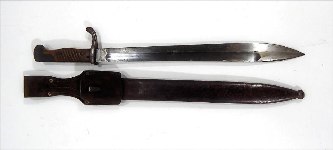 World War 1 German Butcher Blade & Scabbard: World War 1 German Army "Butcher Blade", marked 'Waffenbabrik Mauser AG". condition: Good to Very Good Length: 19.5"