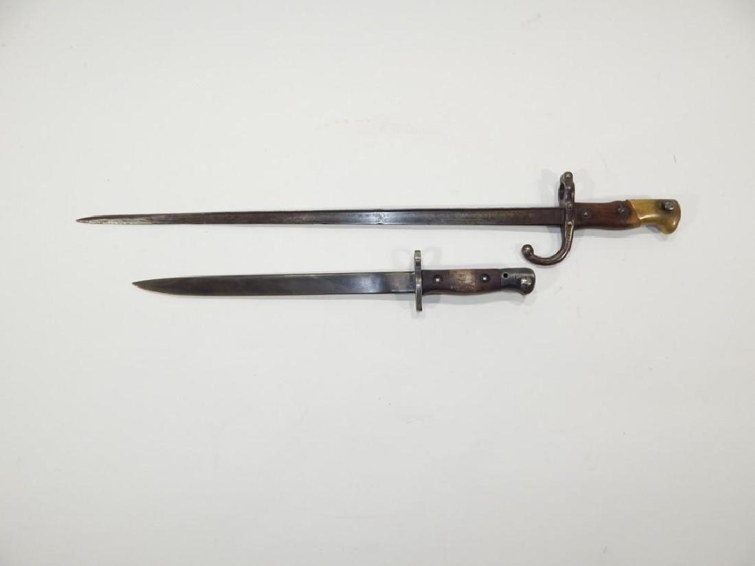 Two Early Bayonets, British & French: WW1 British bayonet w/proofmarks & Model 1878 French Bayonet stamped on cross guard. Good overall condition. Measurements: British 15 1/2" French 25 1/2" in length