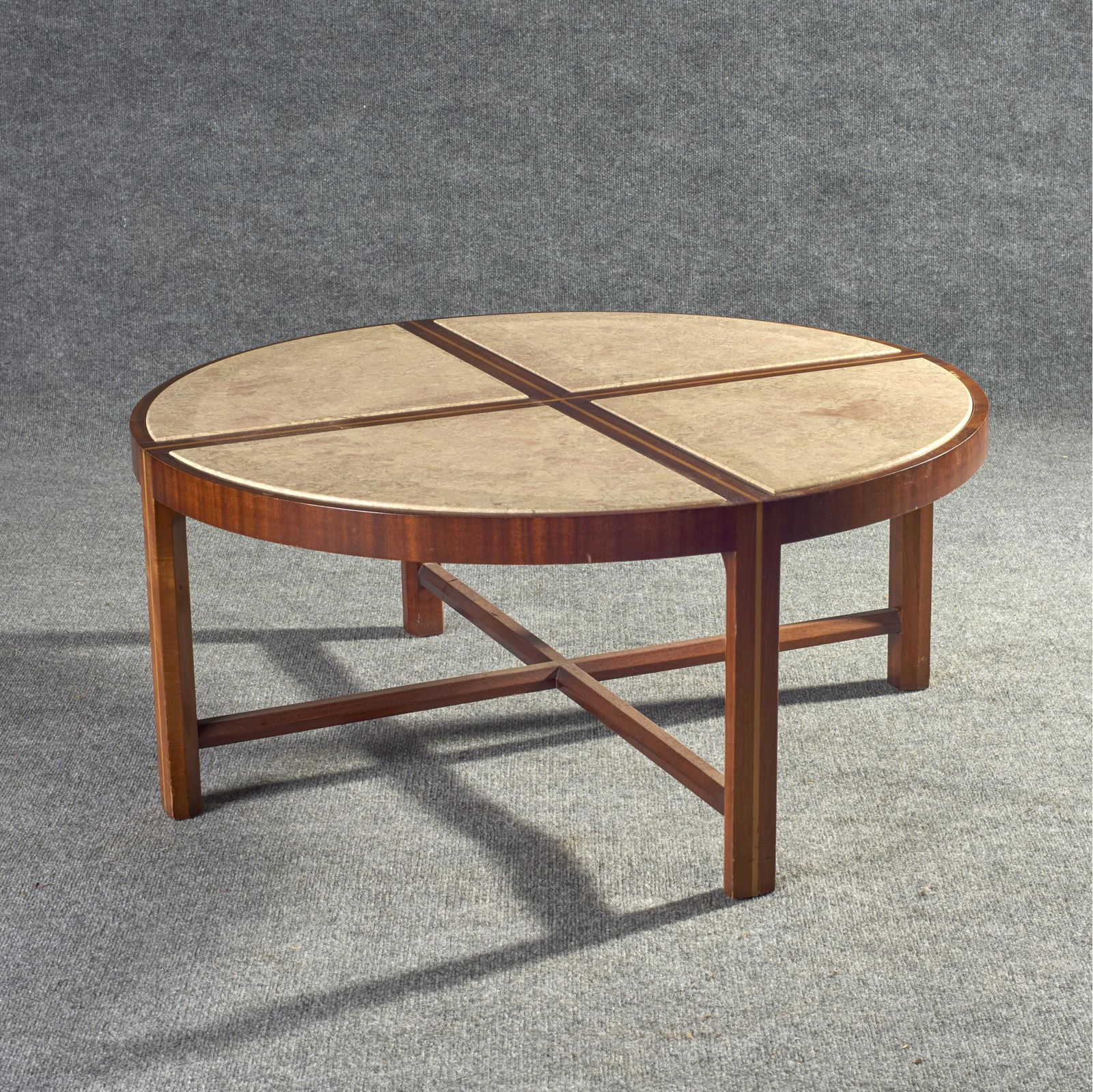 Tommi Parzinger For Charak Modern, Coffee Table With: Tommi Parzinger for Charak Modern mid-century round mahogany and mixed wood veneers coffee table and marble insert top . Condition: Minor scratches. Measures: 16 1/2" H x 38 1/2" Diameter