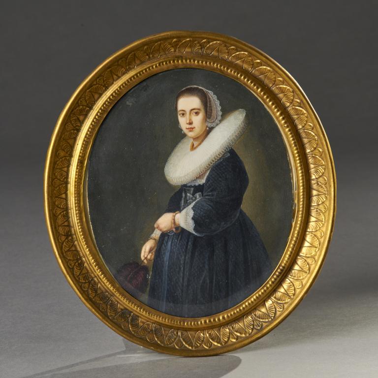 Dutch School Miniature Portrait on Bone: Dutch school mini oval portrait on bone of a 17th century women with brass frame. Measures: 6 1/4" x 5 1/4" sight, 8" x 7 1/4" overall.