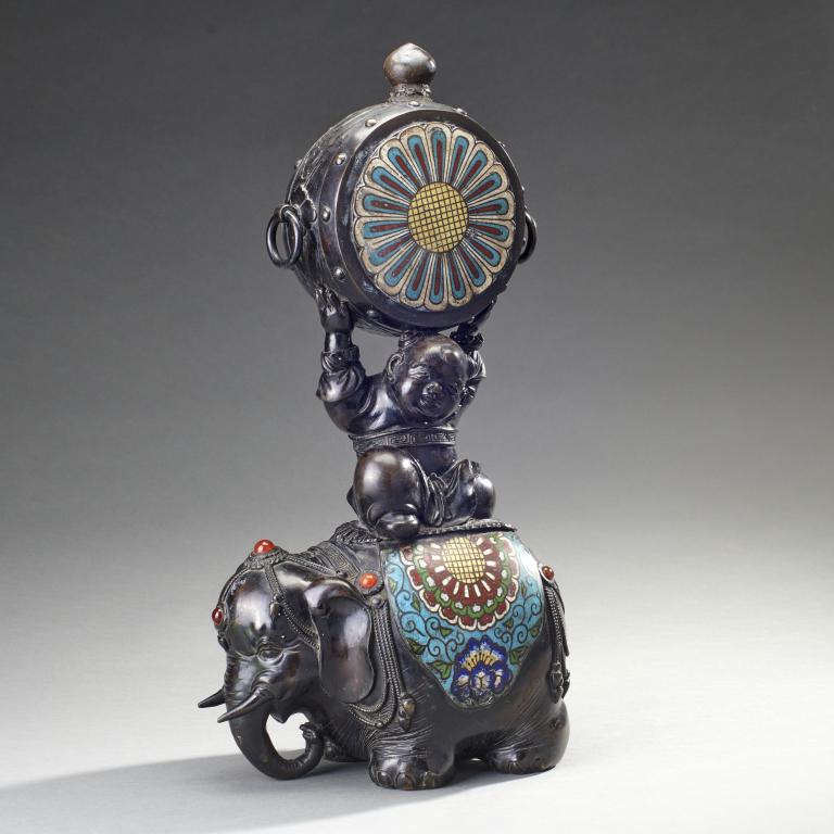 Bronze Champleve Elephant and Child: Bronze champleve and cabochan decorated elephant with child. Measures: 21" tall