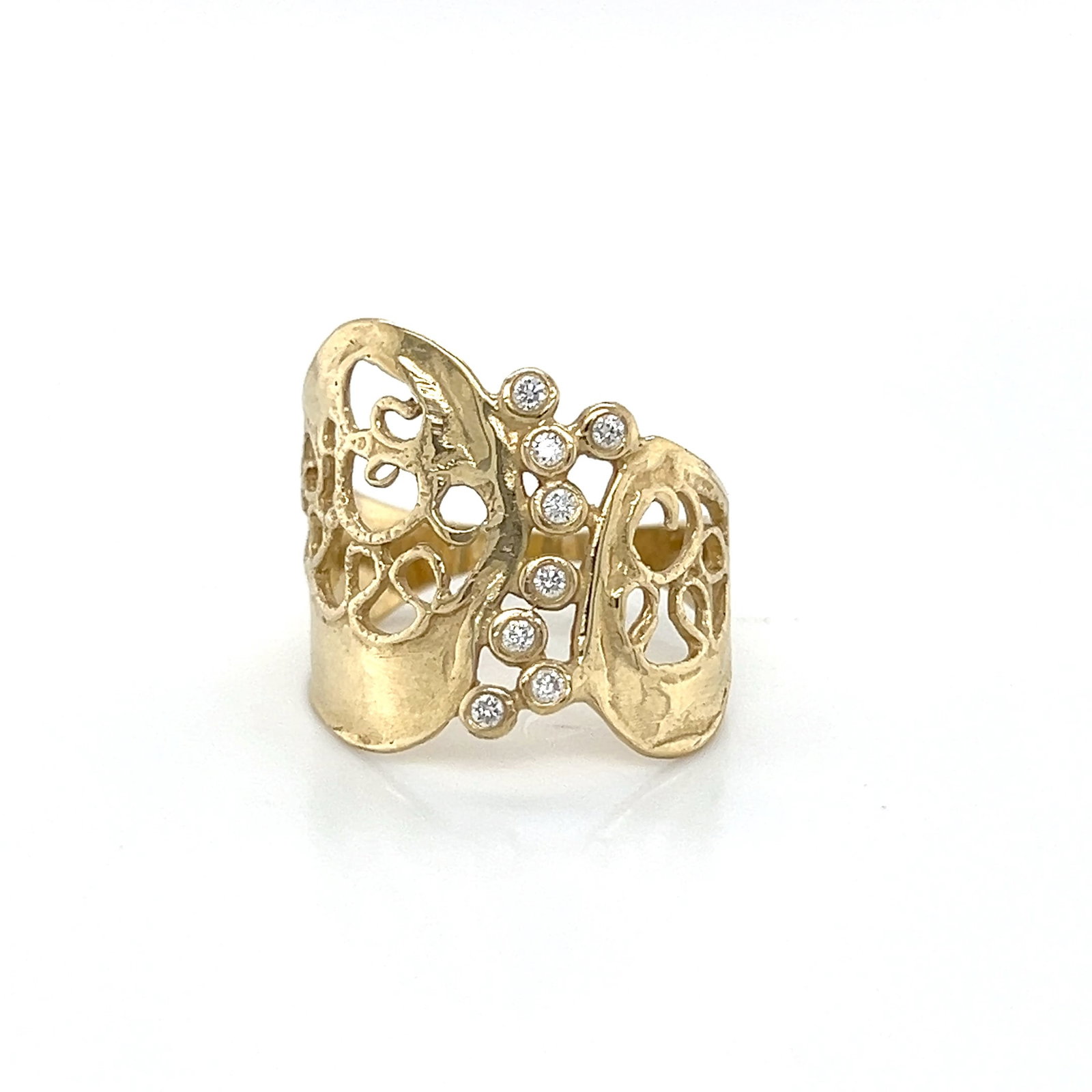 14K Gold Filigree Ring with Diamond Accents: 14k yellow gold and diamond ring. Weight: 3.8g Size: 7.75 Width: 1.5mm -19.2mm A 14K gold ring featuring an intricate filigree design with diamond accents. The ring is marked "14K&qu
