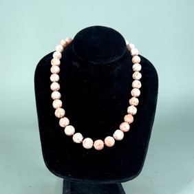 Carved Angel Skin Coral Necklace