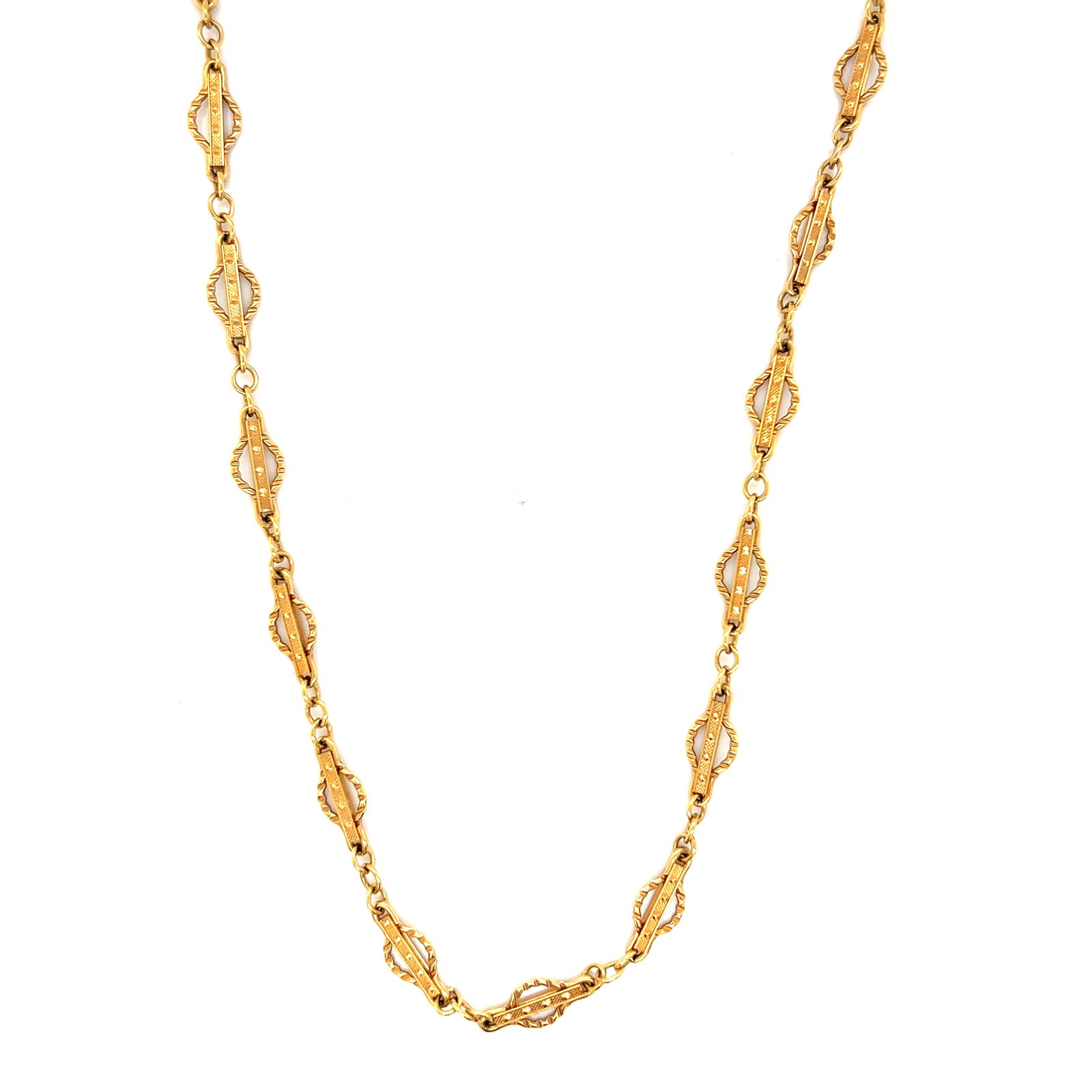 Victorian 14k Gothic Revival Geometric Chain: 14k yellow gold Victorian Gothic Revival geometric chain, each link with incised lines and dots in relief. Weight: 15.9g Length: 20.5'' Width: 5.7mm 