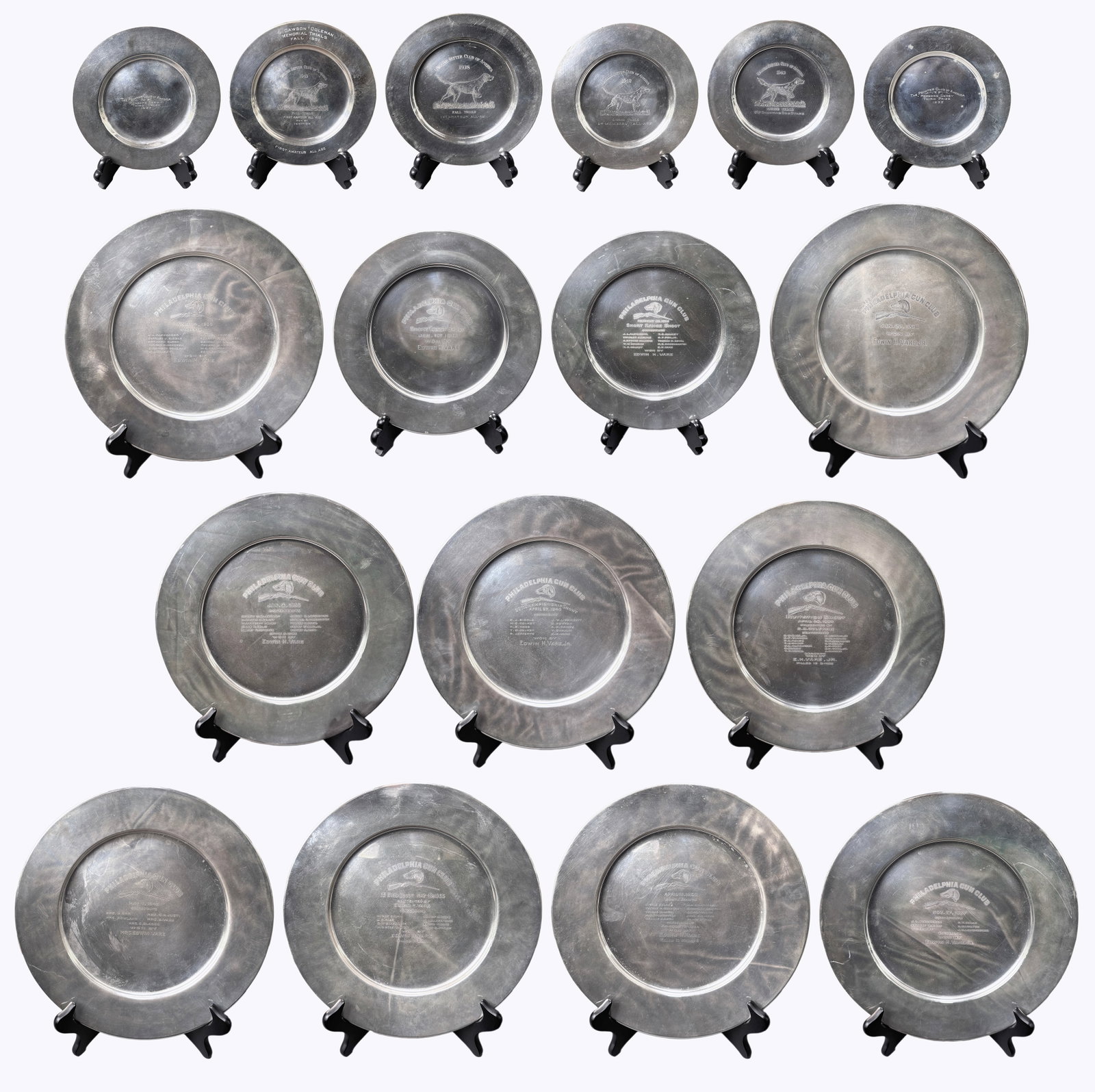 Set of Sterling Silver Trophy Plates: Featuring 17 sterling silver trophy plates awarded Philadelphia Gun Club, Pointer Club of America and the English Setter Club of America, from the 1930s and 40s. Total weight: 5074 grams Diameter
