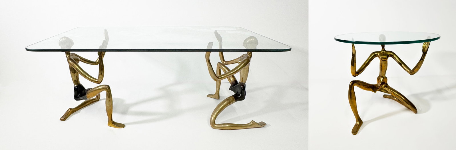 Surawongse Mid-Century Brass and Glass Tables: Surawongse, Thai mid-century glass top coffee table with rounded edges an a 2 nude brass sculpture base, signed and numbered on 1 sculpture 75/1000. And 1 glass round top side table with nude sculptur