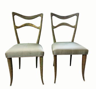 Pair of Melchiorre Bega (attr.) Dining Chairs: A pair of Melchiorre Bega, attributed, mid-century modern Italian dining chairs featuring sculptural wood frames and button-tufted upholstery. Dimensions: Height: 33" Width: 18" Depth: 18