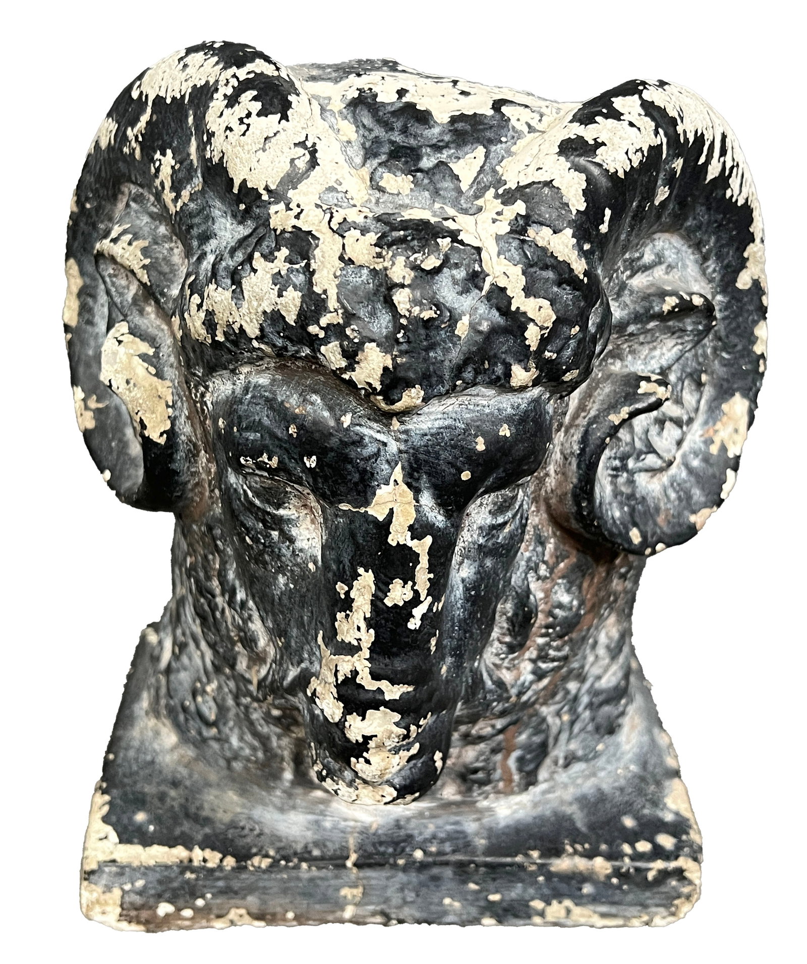 Poured Stone Ram's Head Sculpture: A ram's head sculpture crafted from poured stone, featuring detailed carved elements of the ram's face and curled horns. The piece is painted in black with white chipping throughout,