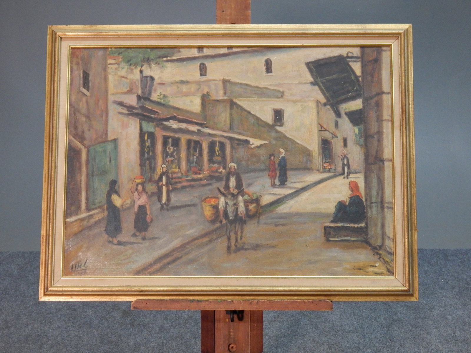 Street Scene with Figures and Donkey: Signed by unknown artist, lower left corner. Dimensions: 27" x 18" (sight); 22.75" x 30.5" (framed)