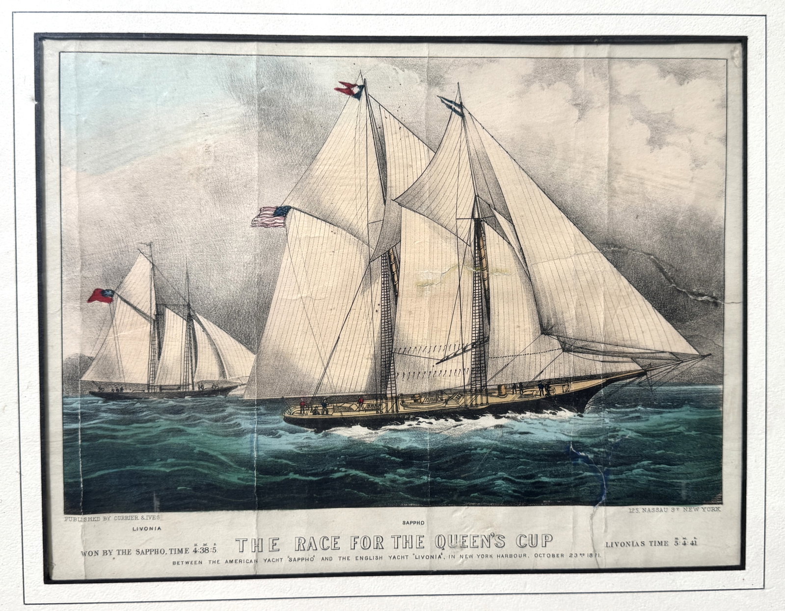 Hand-Colored Print: The Race for the Queen's Cup: Hand-colored print depicting a sailing race, "The Race for the Queen's Cup," circa 1871. Published by Currier & Ives. Matted and adhered to cardboard backing, covered with thin