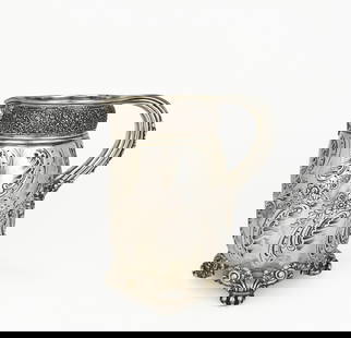 Moses Brown Ives Goddard Tiffany & Co Sterling Silver Pitcher, 1888: Sterling silver water pitcher by Tiffany & Co, 1888, acanthine lip and handle, the neck with die-rolled band of garlanded acanthus and flowers, jug shape, raised on paw feet with acanthus scr