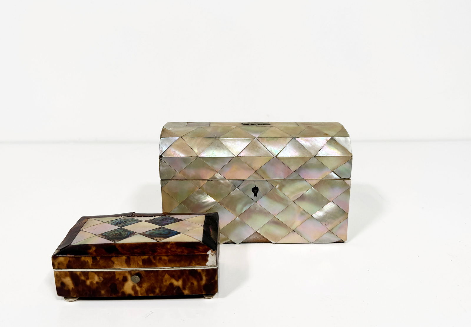Two 19th Century Mother of Pearl Boxes: Two 19th century boxes: Mother of pearl mosaic box, 4 inches by 3 inches by 2 inches Mother or pearl and tortoiseshell box, 3 inches by 2 inches by 1 inch Large Bamboo and Bone Inlay