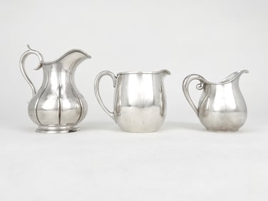 Three Silver Pitchers